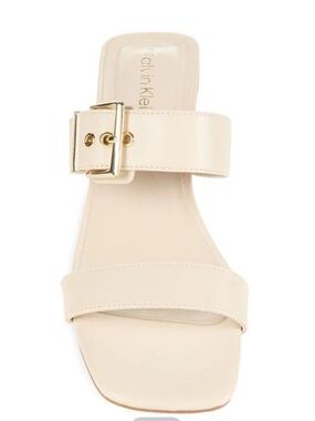 Calvin Klein Cream Slide Sandal with Gold Buckle